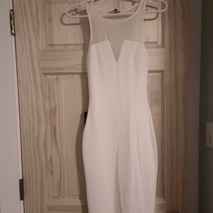 White mid length Bebe dress.
